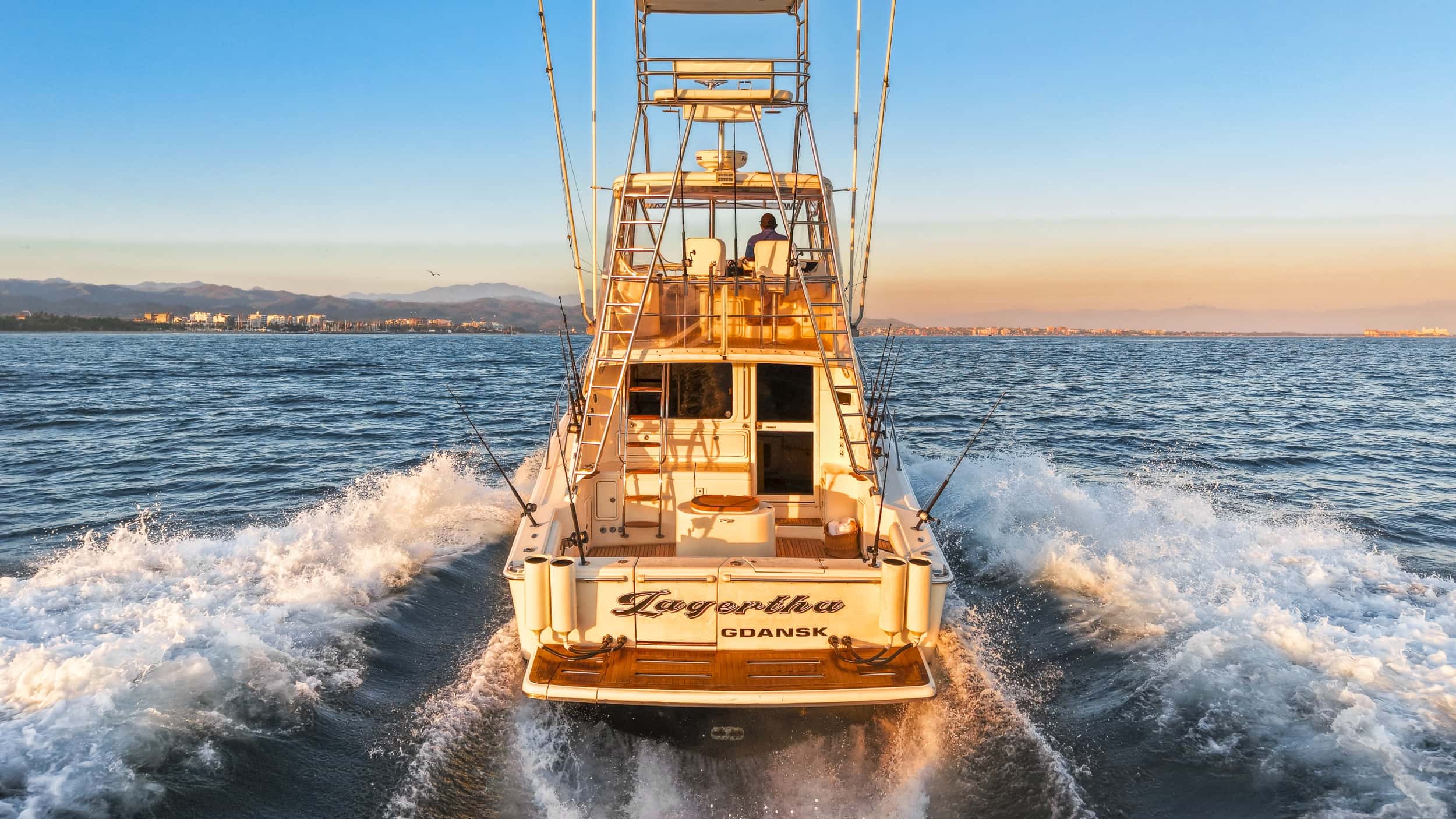 Aerial view of Riviera 45 charter yacht in turquoise water